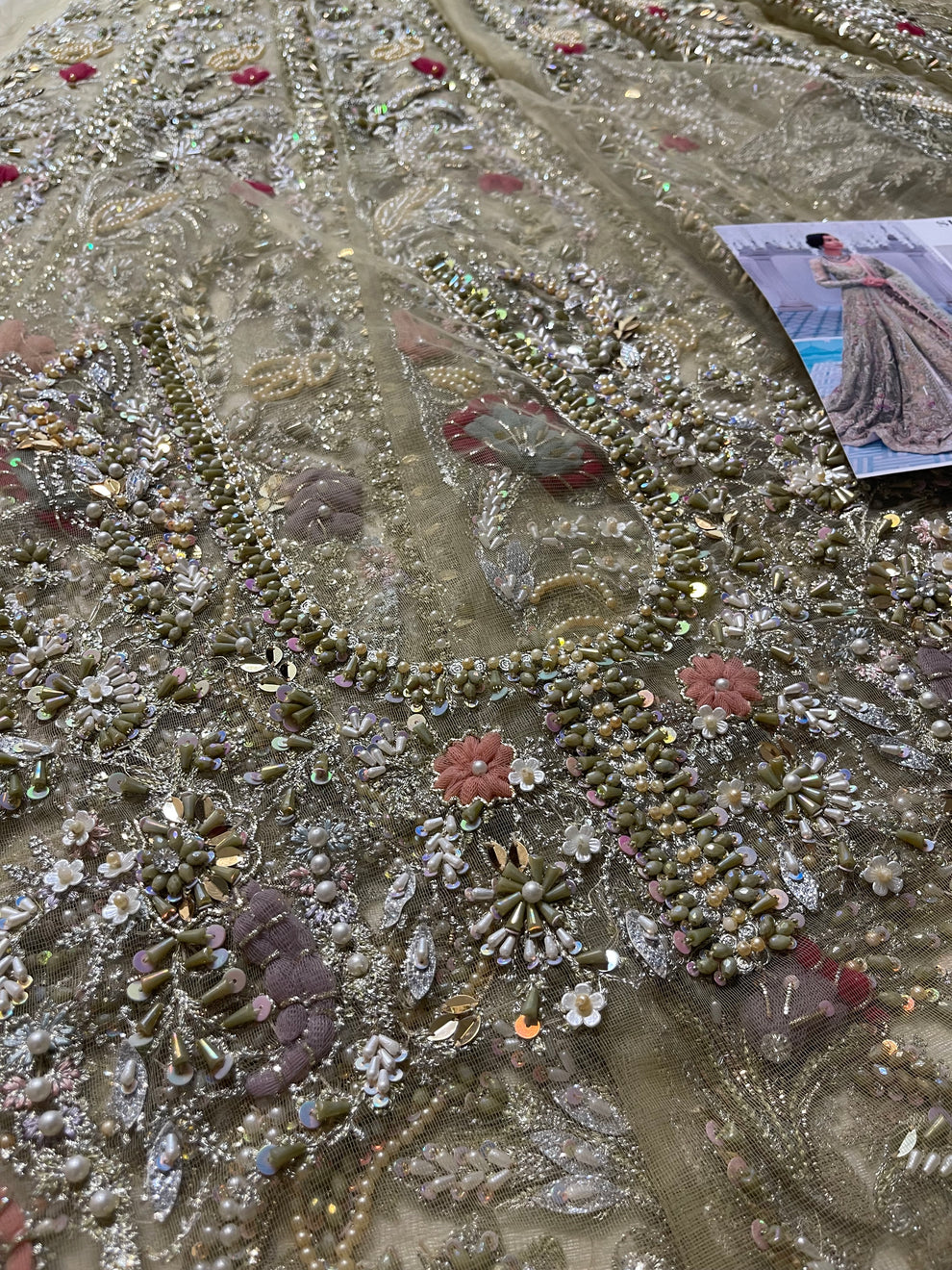 Suffuse Iris Bridal Couture: Exquisite Hand-Embroidered Organza Lehenga with Swarovski Crystals